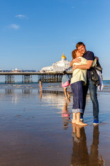 Wall Mural - senior woman with his son at English channel, UK