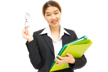 Cheerful business woman holding folder on white background