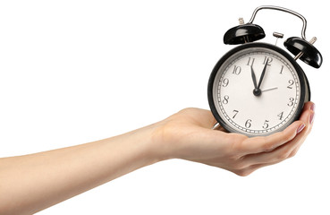 Hand holding retro alarm clock with white background