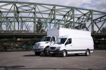 Wall Mural - Semi truck and mini cargo van ready for delivery