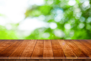 Wall Mural - wooden tabletop perspective for product placement or montage with focus to table. wooden board surfa