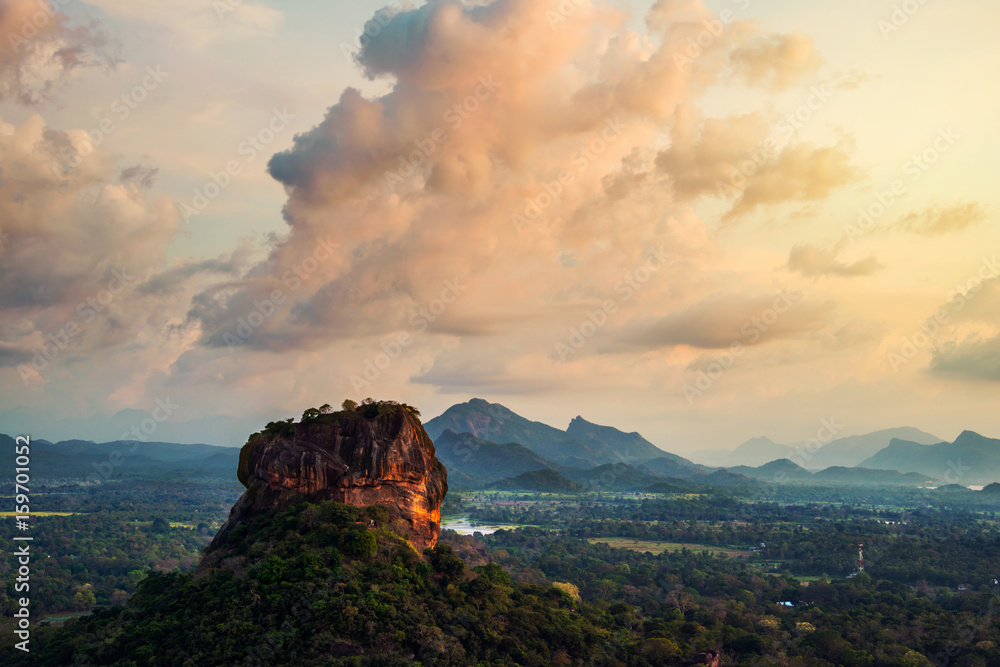 Sunset over the Lion Rock in Sigiriya, Sri Lanka - obrazy, fototapety, plakaty 