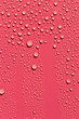 Red abstract background, rain drops on surface