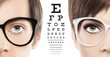 eyes and eyeglasses close up on visual test chart, eyesight and eye examination concept in white background