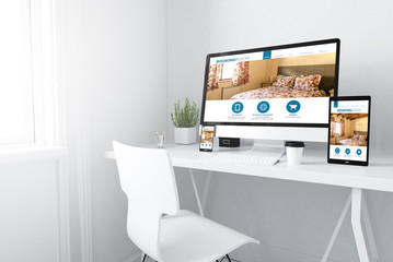 Wall Mural - devices on white minimal booking room website
