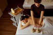 © Studio Romantic - Massage of young woman lying in spa salon.