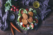 © The Picture Pantry - Salad and chickpea fritters served on a plate for vegetarian lunch