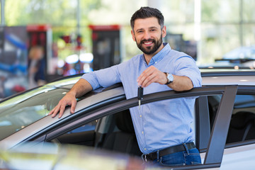 Poster - Happy young man with his new car
