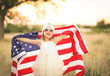 © MeganBetteridge - Adorable patriotic girl with american flag