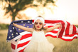 © MeganBetteridge - Adorable patriotic girl with american flag
