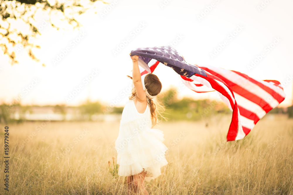 Obraz na płótnie Adorable patriotic girl with american flag w salonie