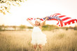 © MeganBetteridge - Adorable patriotic girl with american flag