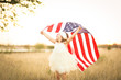 © MeganBetteridge - Adorable patriotic girl with american flag