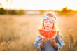 © MeganBetteridge - Adorable girl with watermelon slice