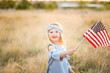 © MeganBetteridge - Adorable patriotic girl with american flag