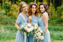 Beautiful Bridesmaids At The Wedding. Lovely Dresses.