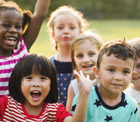 Sticker - Group of kindergarten kids friends playing playground fun and smiling