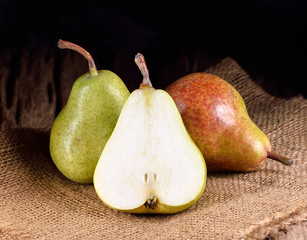 fresh ripe pears on wooden table