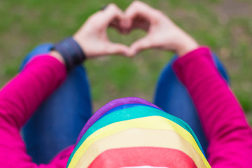 woman with a rainbown bandanna