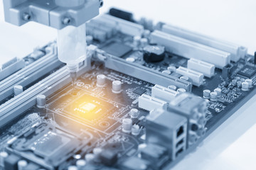 the cpu chip on computer main board.hi-technology concept.