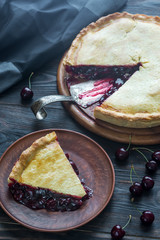 Poster - Cherry pie on the wooden background