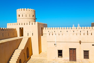  in oman    muscat    the   old defensive  fort battlesment sky and  star brick