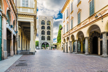 Como city, historic center, lake Como, Italy. Medieval tower (12th century), called Porta Torre and via Cantù