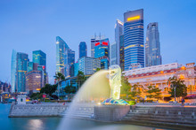 The Merlion And Buidlings In City Center Of Singapore
