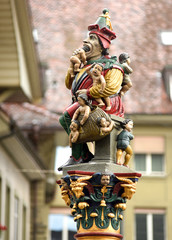 Canvas Print - Famous fountain and statue of ogre eating small children in Berne, Switzerland