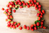 Fototapeta Tulipany - freshly harvested strawberries - healthy lifestyle fruit concept