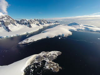 Wall Mural - Rare aerial footage of Port Lockroy area, Antarctica. Really high above ground. Unbelievable beauty of nature.