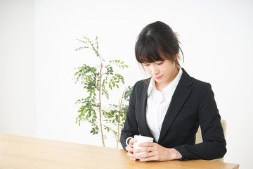 Business woman relaxing at cafe