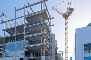 building construction site for a low rise development with a crane in viaduct harbour and wynyard qu