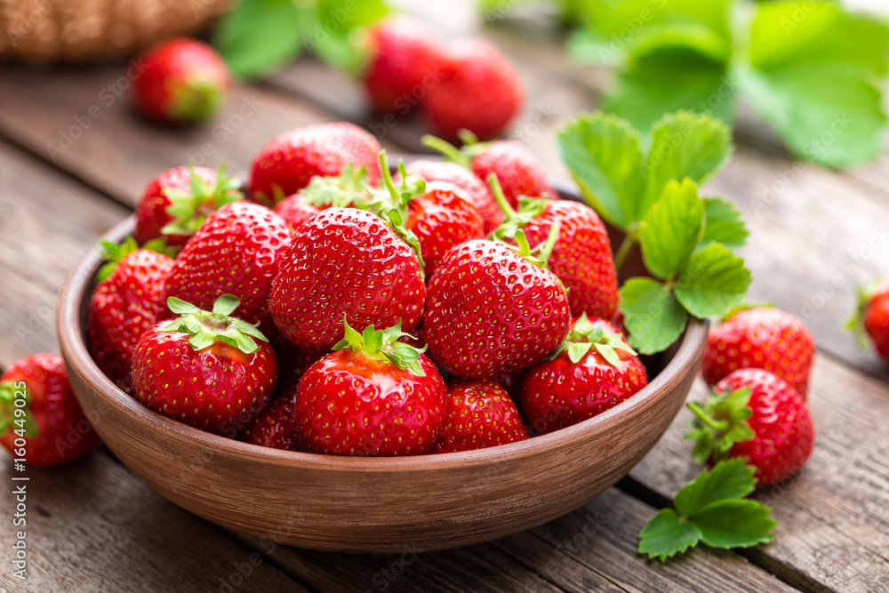 Fresh juicy strawberries with leaves. Strawberry. Stock Photo | Adobe Stock