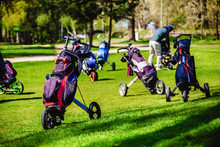 Golf Bags, Golf Clubs In Golf Bag On The Fairway
