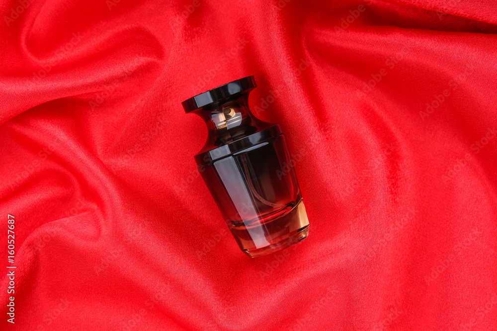 Perfume bottle on cloth