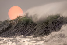 Breaking Wave At Sunset