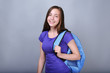 © Africa Studio - Cute pretty girl with schoolbag on color background