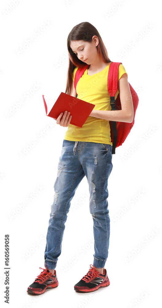 Cute pretty girl with schoolbag and book on white background