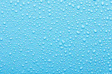 Water Drops On A Blue Background