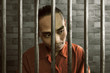 © fotokitas - Asian man in prison