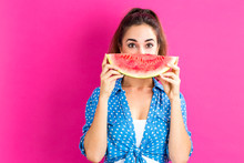 Happy Young Woman Holding Watermelon