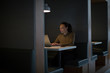 © ReeldealHD images - Businesswoman working late at night in office alone