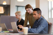 © ReeldealHD images - Manager training new employee in office