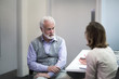© ReeldealHD images - Female Medical Doctor listening to a Senior patient symptoms