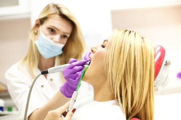 Wall Mural - Young Woman At The Dentist