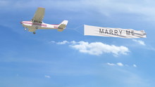 Small Propeller Airplane Towing Banner With MARRY ME Caption In The Sky. 3D Rendering
