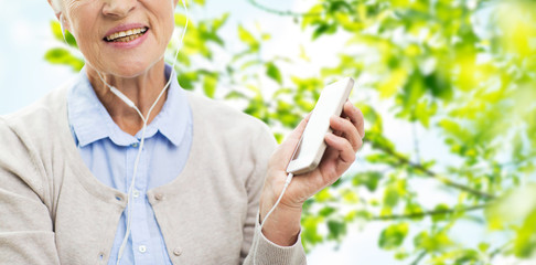 Sticker - happy senior woman with smartphone and earphones