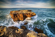 Algarve, Portugal: rocks in the coast of Albufeira at sunrise
