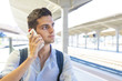 © carballo - young man with the backpack at the train station, travelers